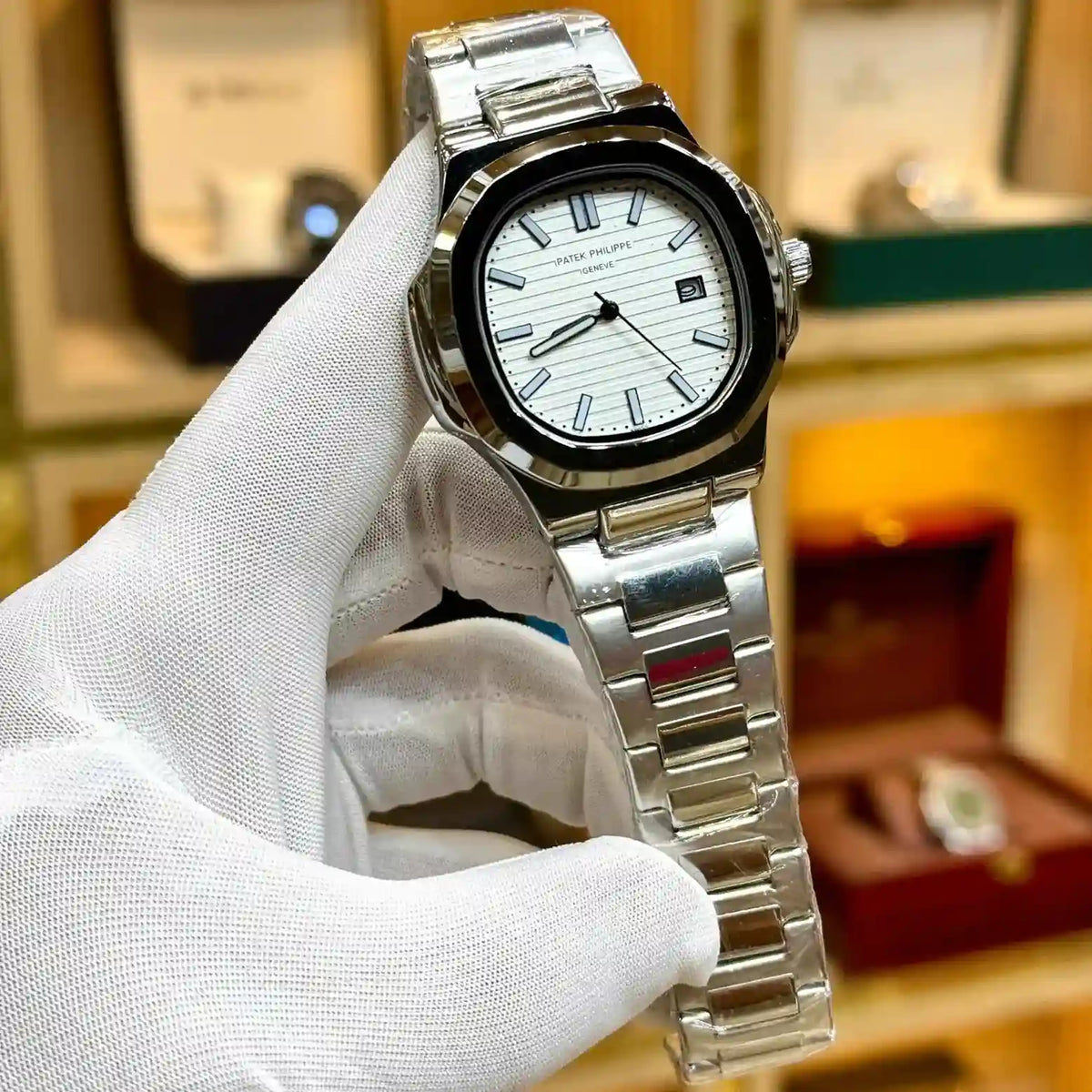 nautilus style luxury watch silver stainless steel bracelet white silver embossed dial men watch