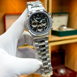 Close-up of CHENXI original chronograph watch with blue dial and three sub-dials
