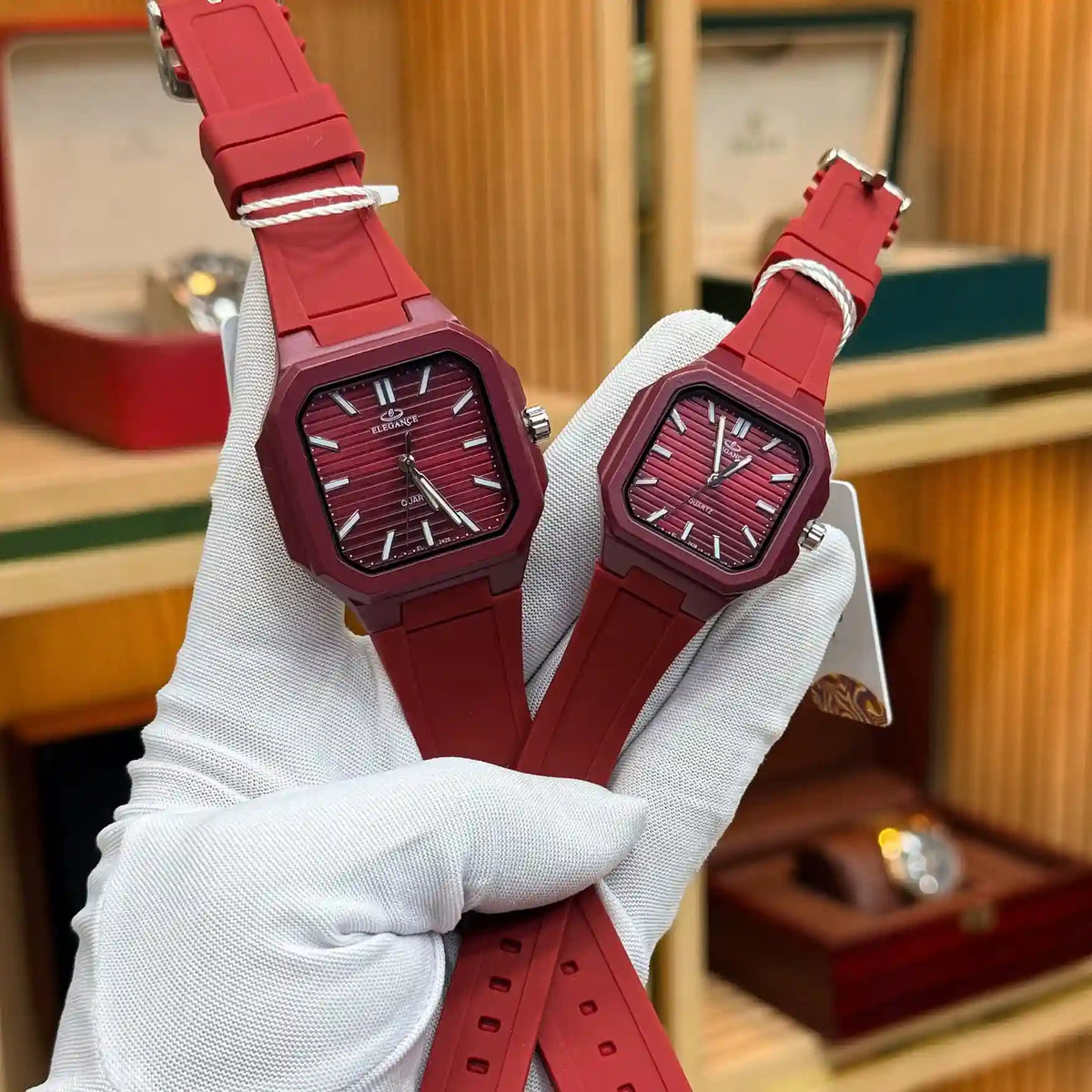 ELEGANCE Original red dial couple watches with matching red straps and burgundy-tone cases