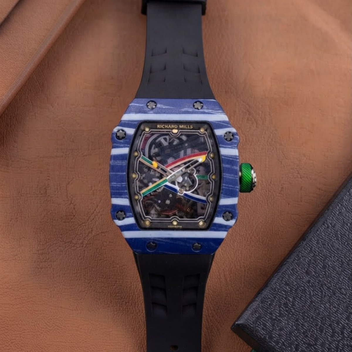 Men's luxury skeleton watch with grey striped carbon-style case and black silicone strap.