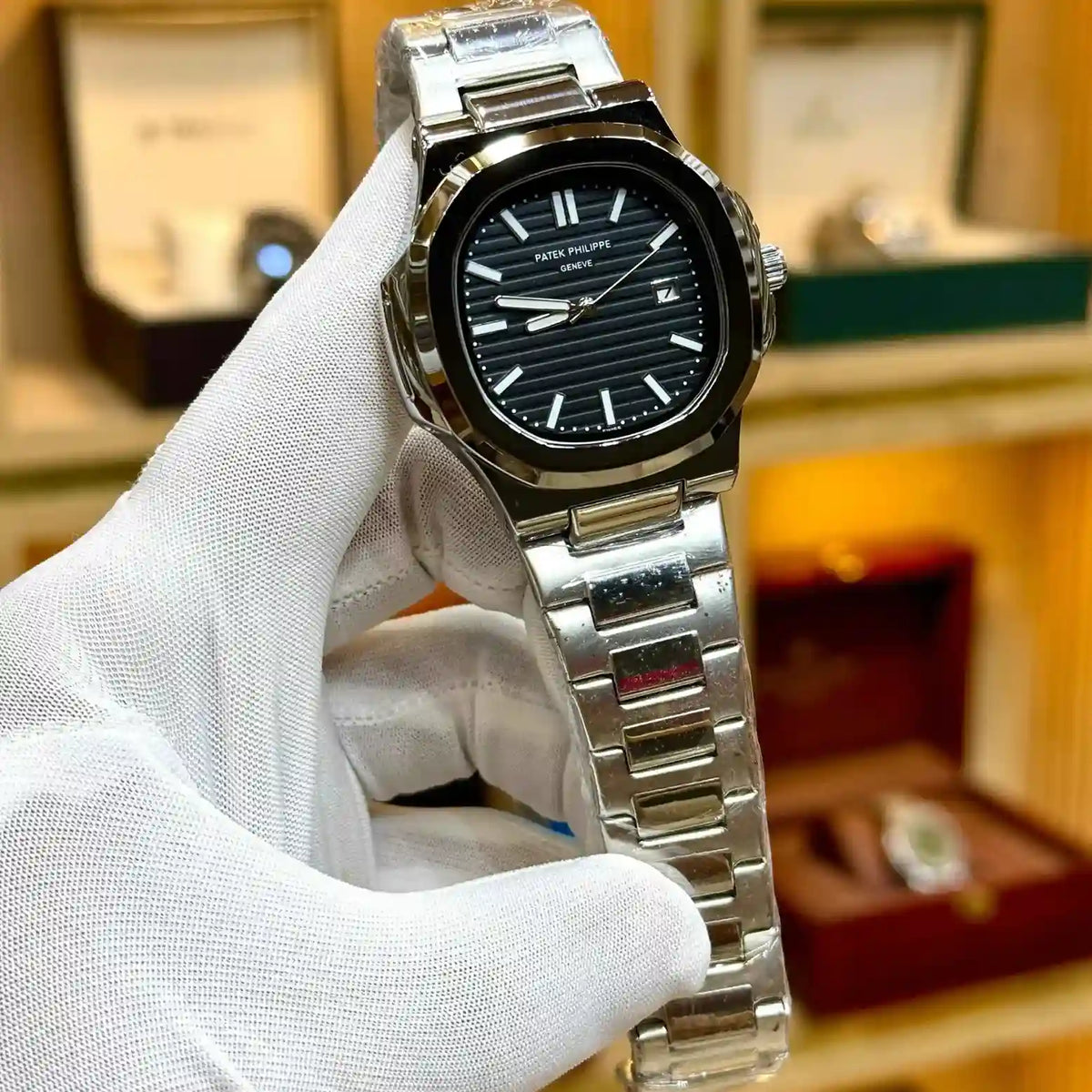nautilus style luxury watch silver stainless steel bracelet black embossed dial men watch