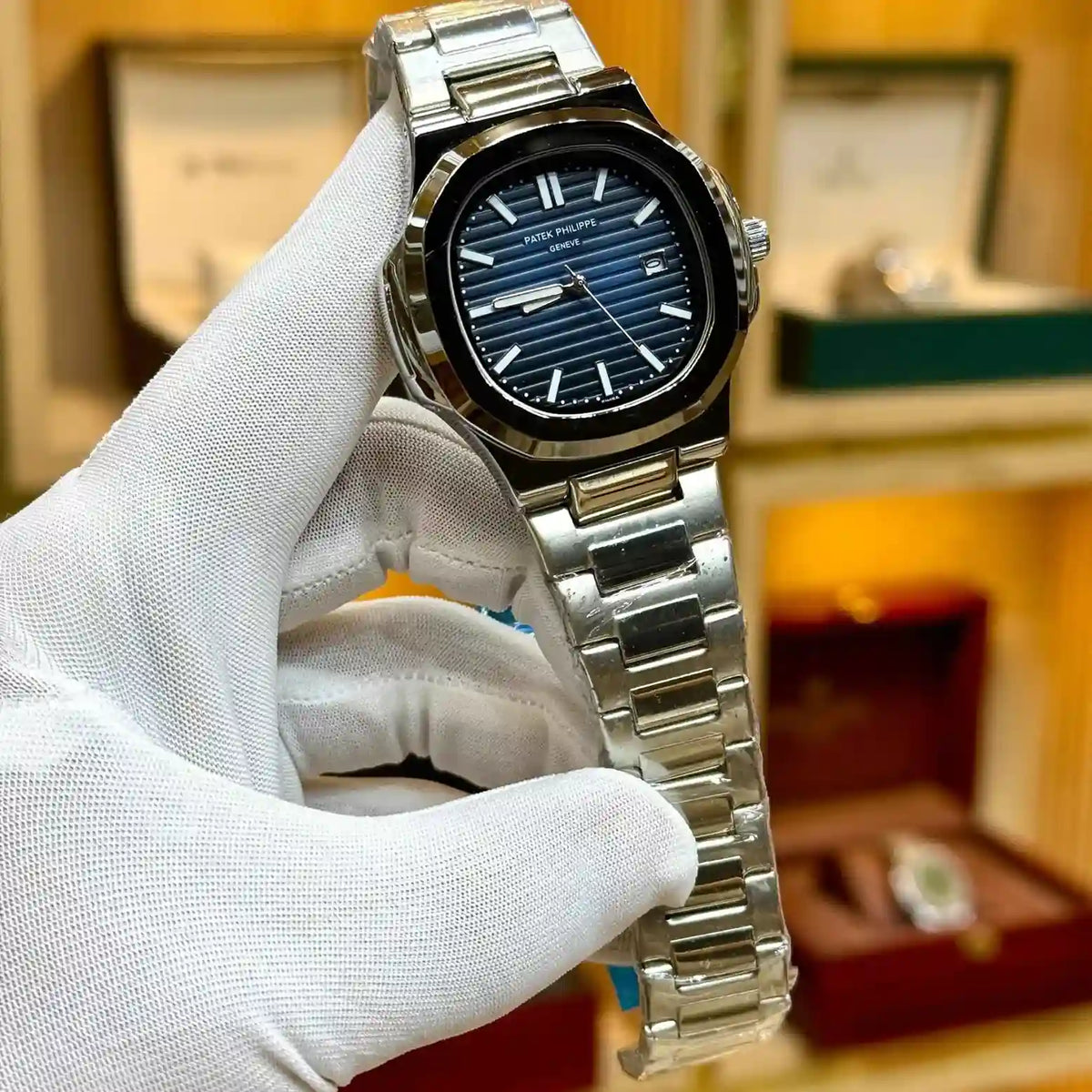 nautilus style luxury watch silver stainless steel bracelet navy blue embossed dial men watch