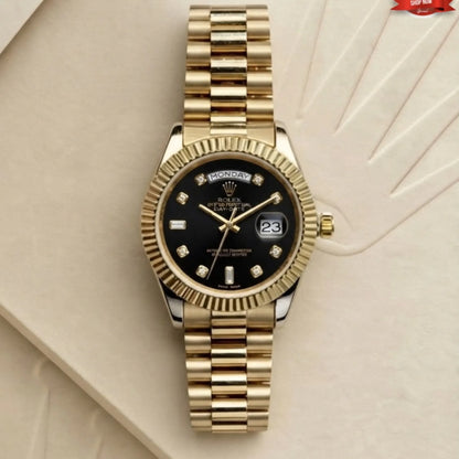 Rolex day-date gold watch with onyx black dial fluted bezel and diamond hour markers
