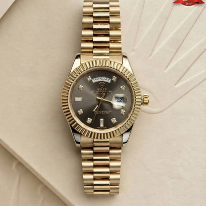 Rolex day-date gold watch with dark slate grey dial and diamond indices