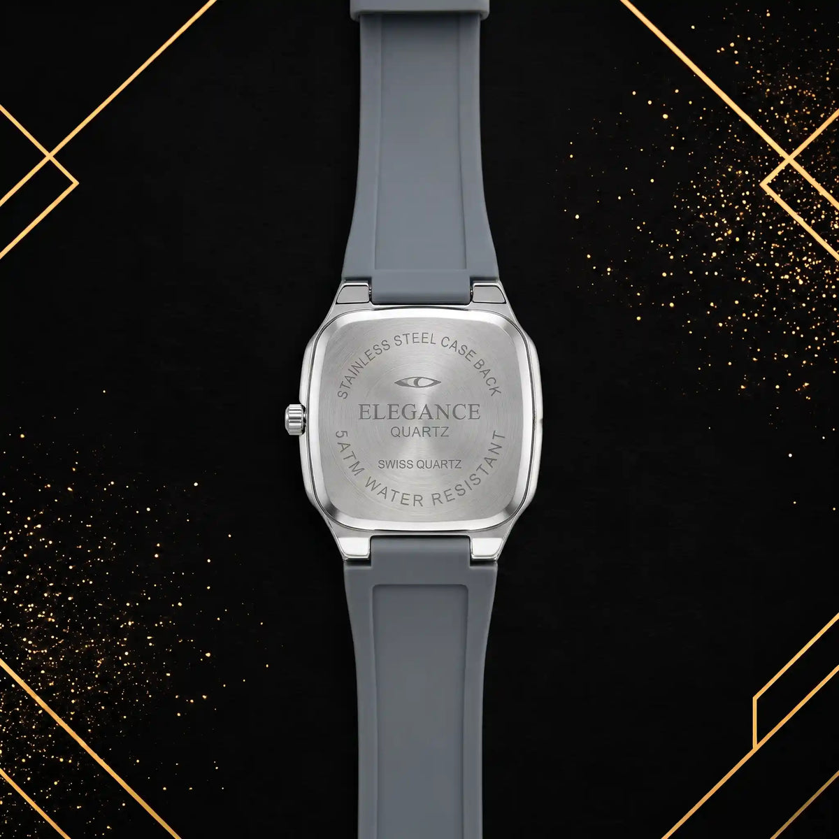 Rear view of the Elegance luxury quartz watch displaying the stainless steel case back, specifications engravings, and durable grey silicone strap.