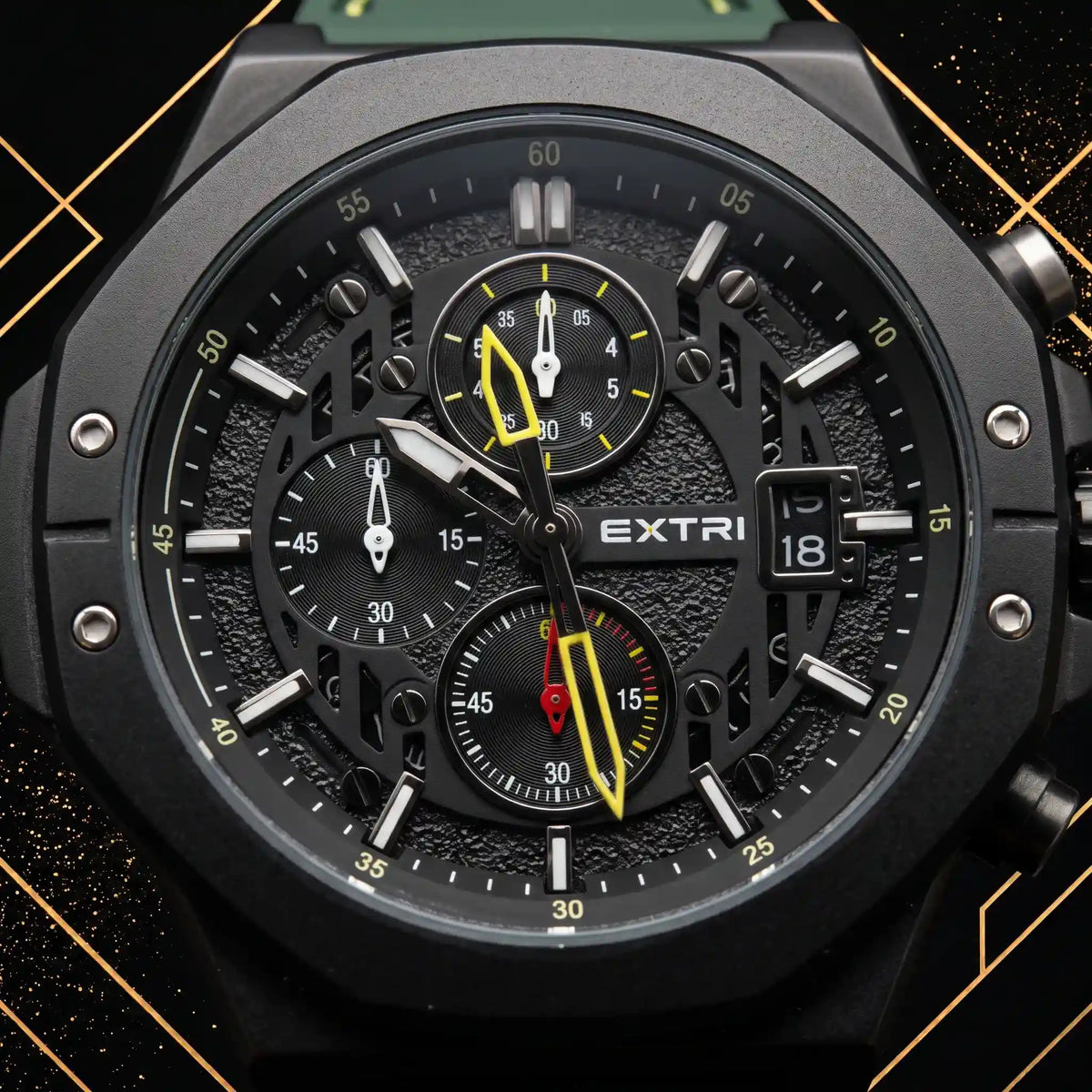 Macro close-up shot of the Extri men's watch dial displaying detailed chronograph subdials, date window, yellow hands, and textured black background.
