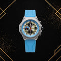 Overhead view of the Extri chronograph watch with a blue strap and yellow-patterned dial.