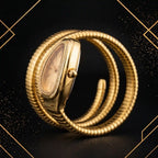 Detailed side profile view of luxury gold serpent wristwatch showing case thickness, winding crown, and ribbed coil bracelet.