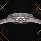 Side profile view of a luxury Rolex watch showcasing the detailed crown logo, bezel, and metallic case against a dark background with gold geometric frames