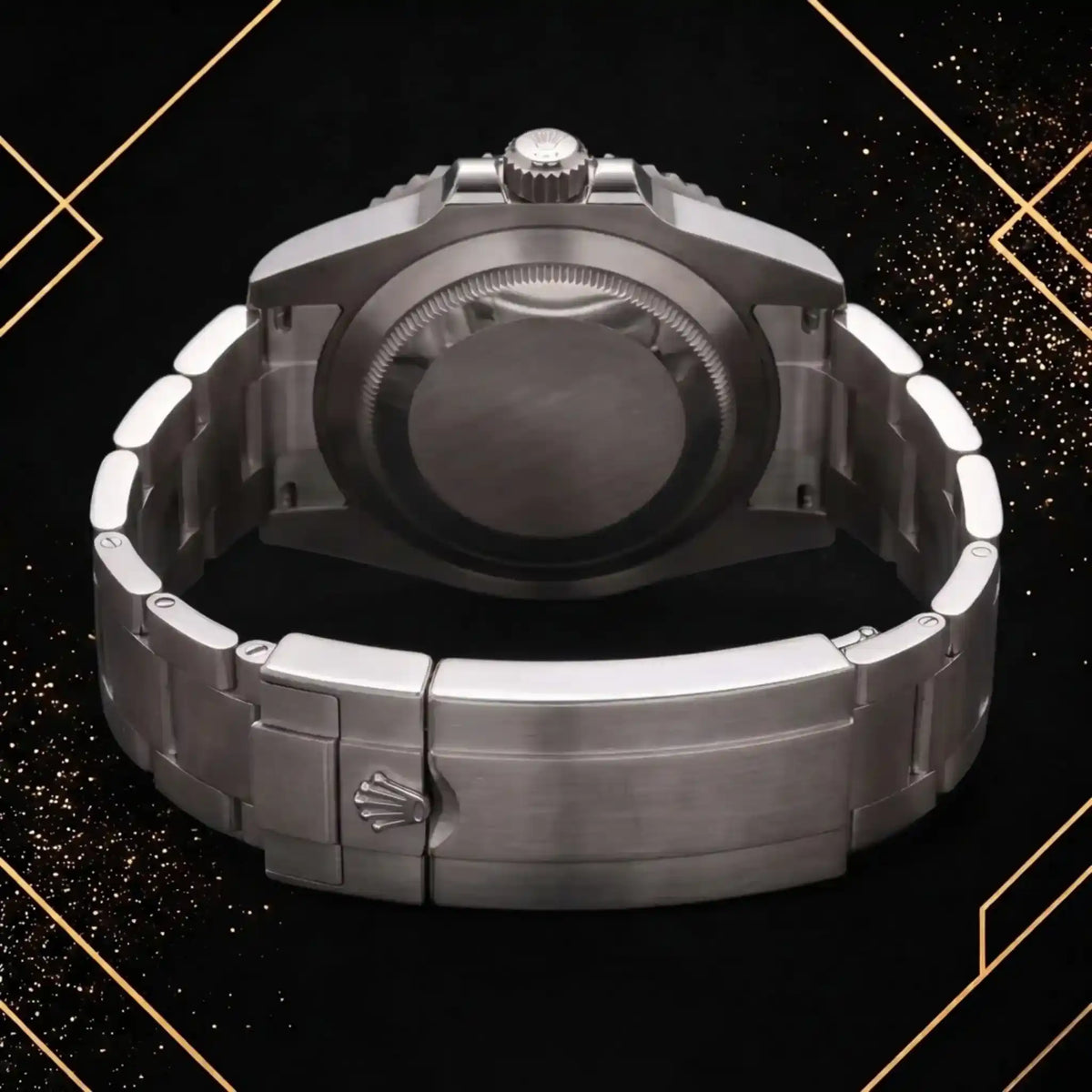 Rolex Submariner stainless steel luxury watch showing its solid caseback, silver metal bracelet, and Rolex crown clasp – back view