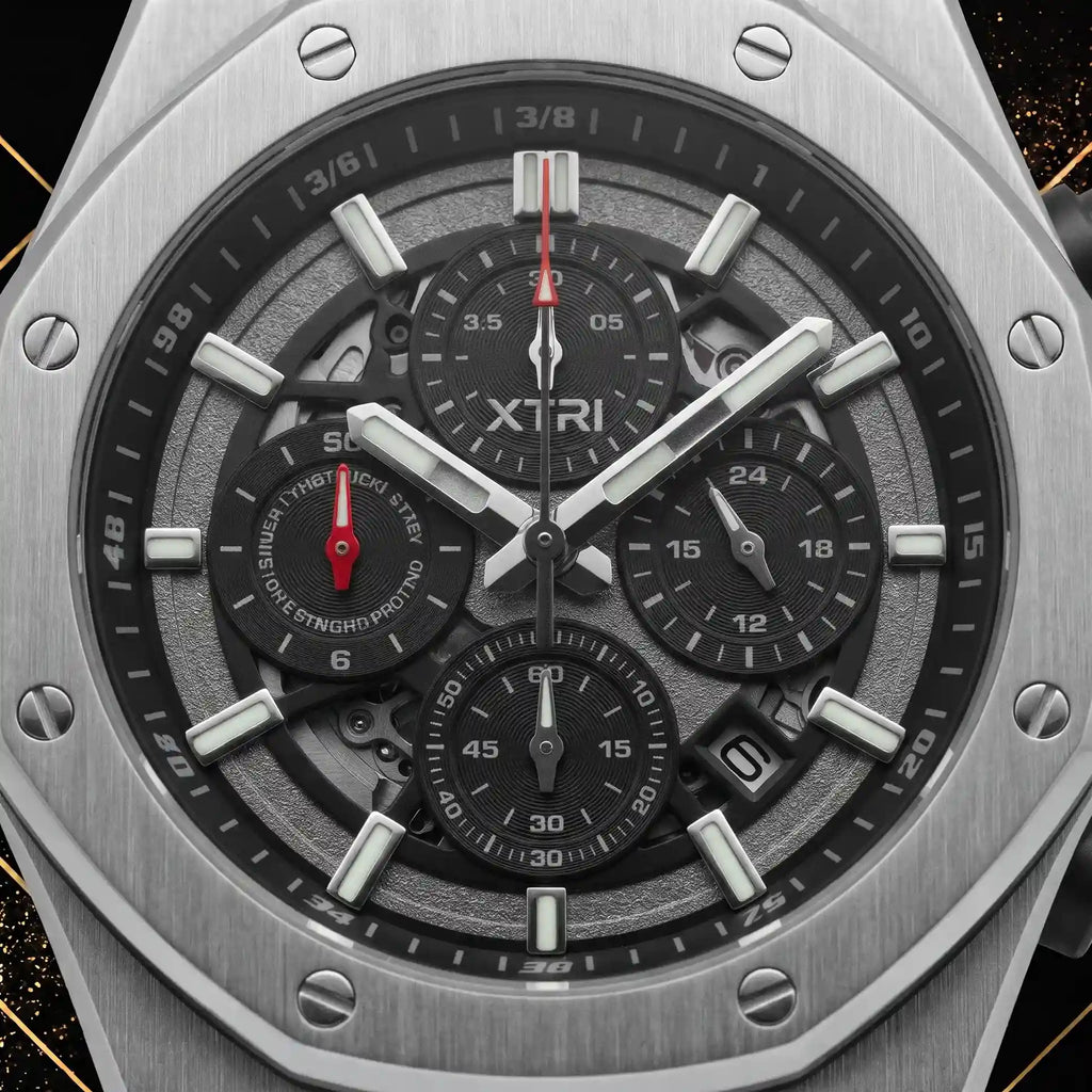 Macro close-up view of the XTRI chronograph dial showing intricate textures, subdials, silver hour markers, date display, and signature branding