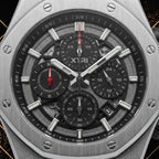 Macro close-up view of the XTRI chronograph dial showing intricate textures, subdials, silver hour markers, date display, and signature branding