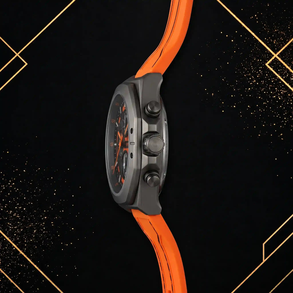 Side profile view of XTRI chronograph watch displaying case thickness, crown, pushers, and orange rubber strap connection
